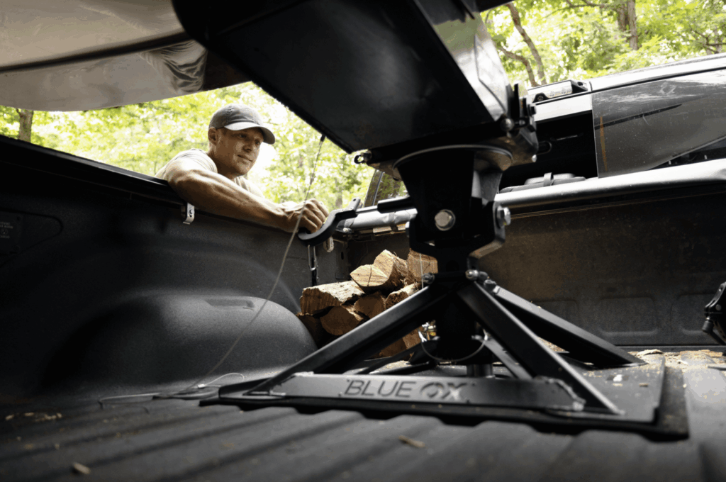 blue of fifth wheel hitch installed in a truck bed